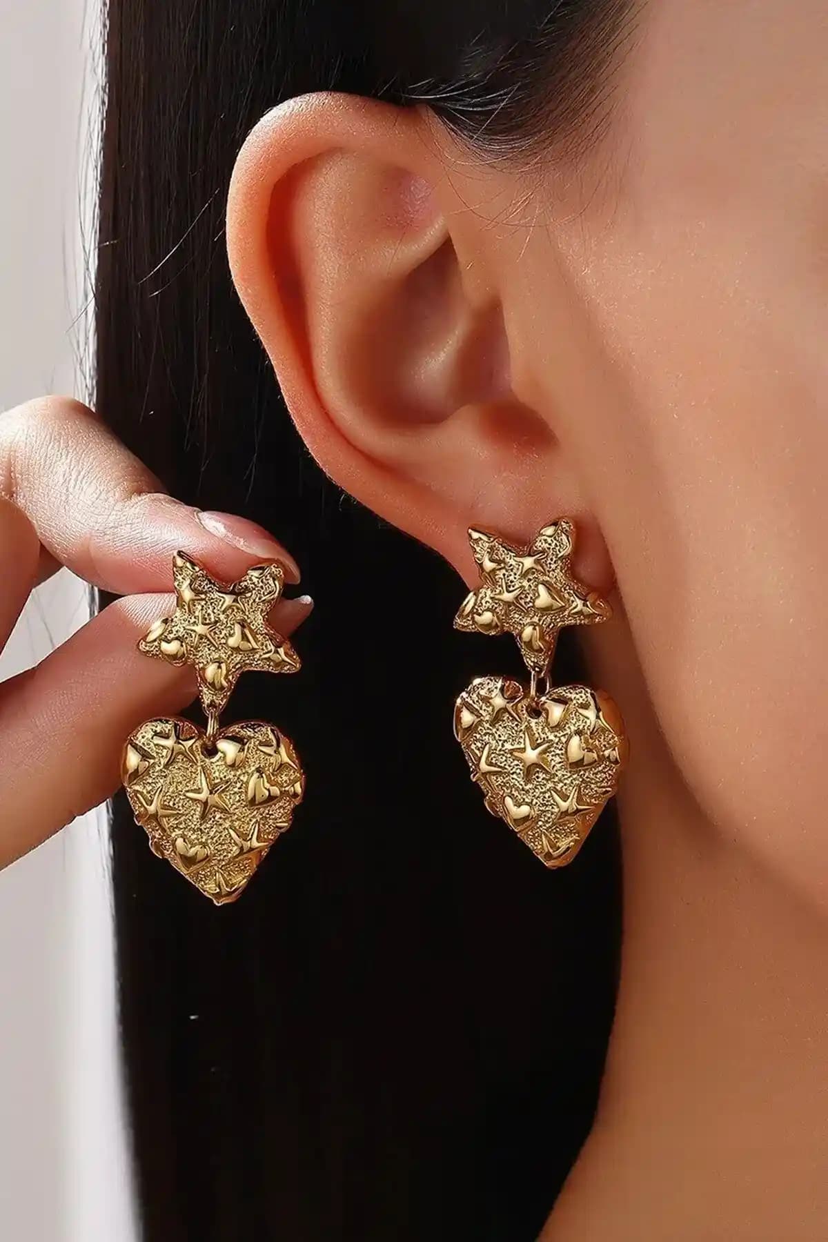 925 Ayar Gümüş Deniz Yılzı ve Kalp Desenli Küpeler: Tasarım ve Kullanım Analizi