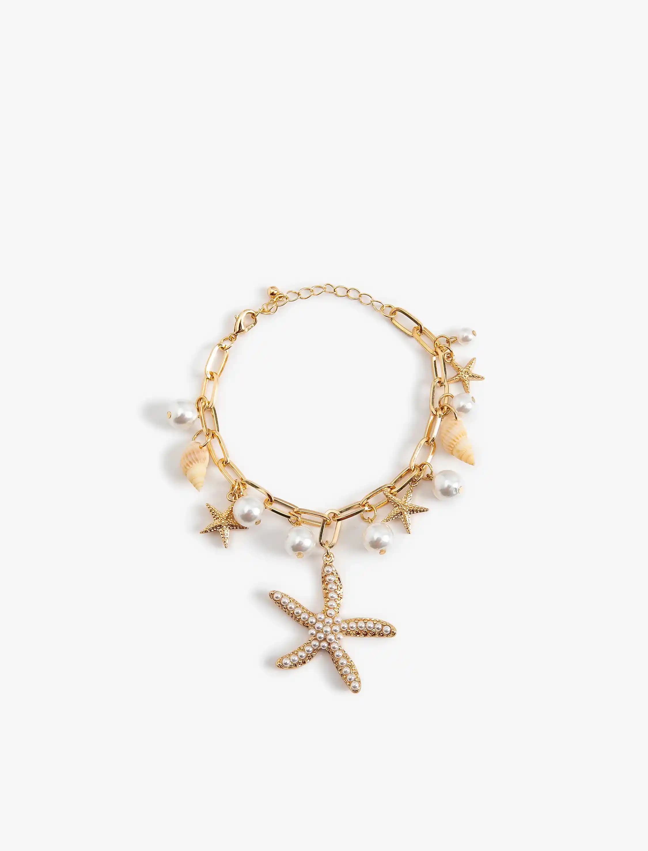 Deniz Temalı Takılar: Deniz Yılzı ve İnci Salkım Bilekliklerin Estetik Özellikleri ve Kullanım Alanları