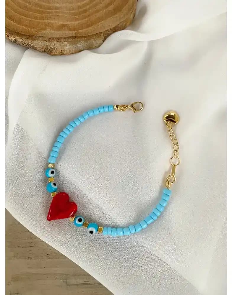 Halhal Tasarımında Renk ve Şeklin Önemi: Turkuaz ve Kırmızı Renklerin Anlamları ve Kullanım Farklılıkları