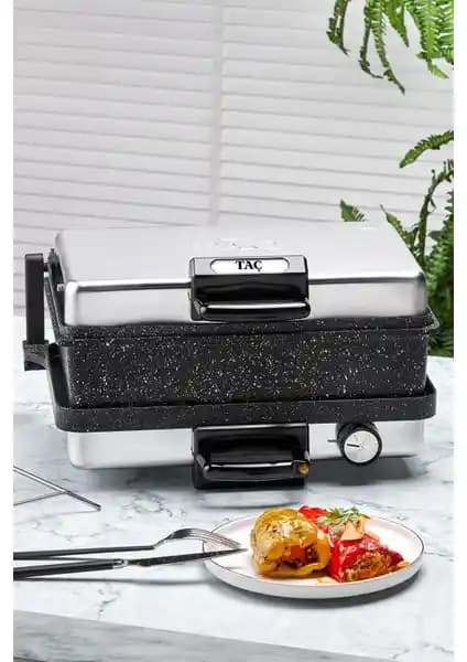 Taç Tost ve Lahmacun Makinası Tepsili: Güçlü Performans ve Estetik Tasarım ile Mutfakta Yenilik